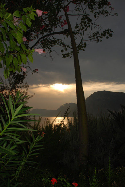 The sun sets over the Amalfi Coast as seen from Villa Lilly’s organic gardens.