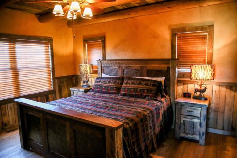 Rustic master bedroom at The Ranches at Belt Creek member cabins.