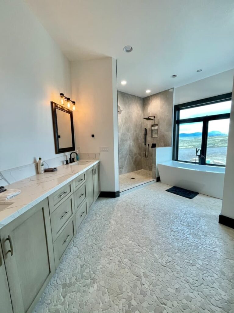 Sunset Ranch bathroom with freestanding tub and separate shower stall