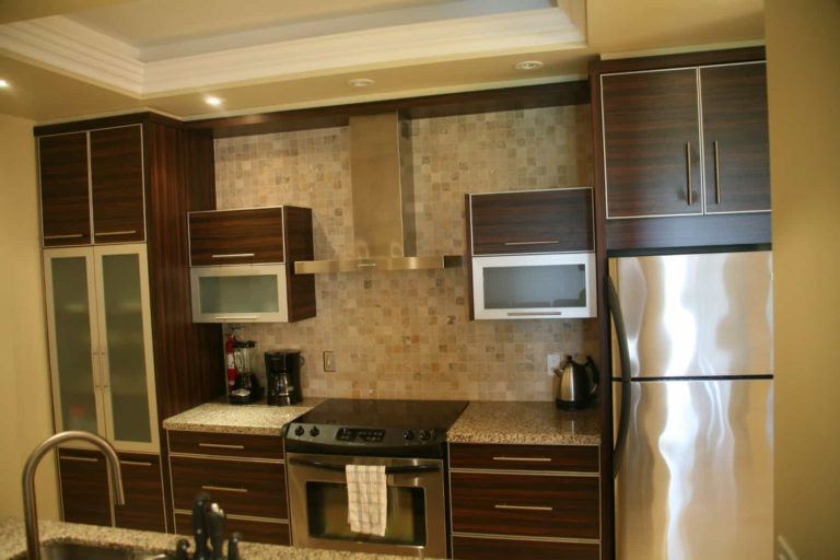 Kitchen with stove: 1 Bedroom Suite at The Atrium Resort