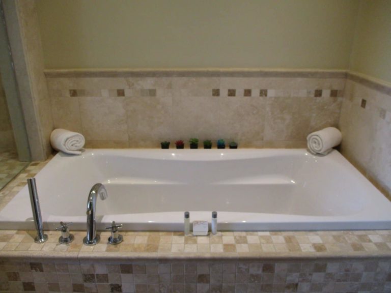 Freestanding bathtub: Premium 1 Bedroom Suite at The Atrium Resort