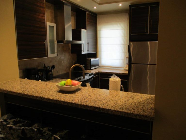Cocina completa y mostrador: Suite Premium de 1 dormitorio en The Atrium Resort