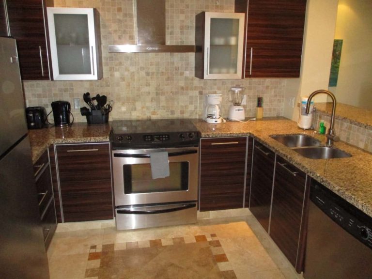 Full kitchen with oven range and sink: 2 Bedroom Suite at The Atrium Resort