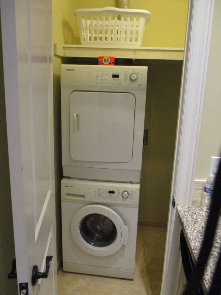 Washer and dryer in a studio suite at The Atrium Resort.