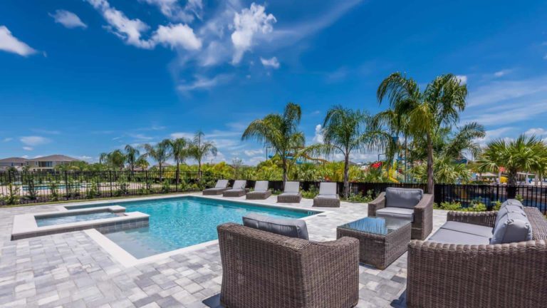 Encore Resort at Reunion residence backyard with private pool and view of the water park.