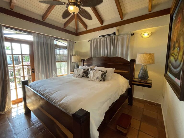 Seafront Vista Villa master bedroom with balcony access