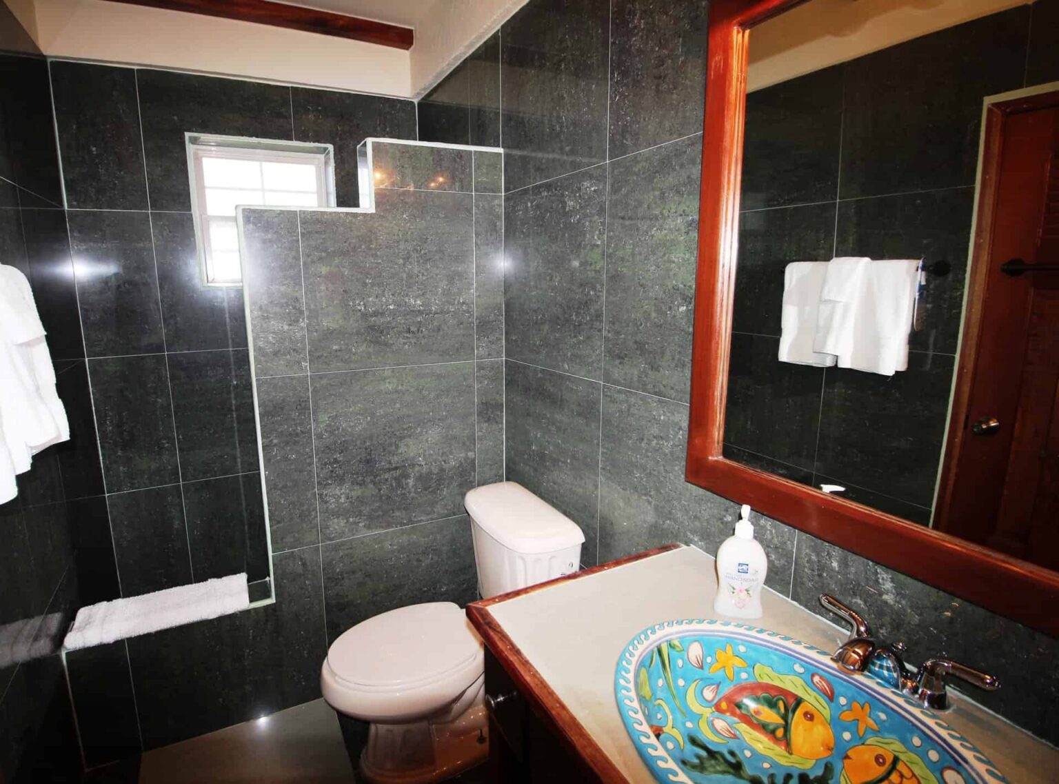 Larger Seafront Villa master bathroom with walk-in shower