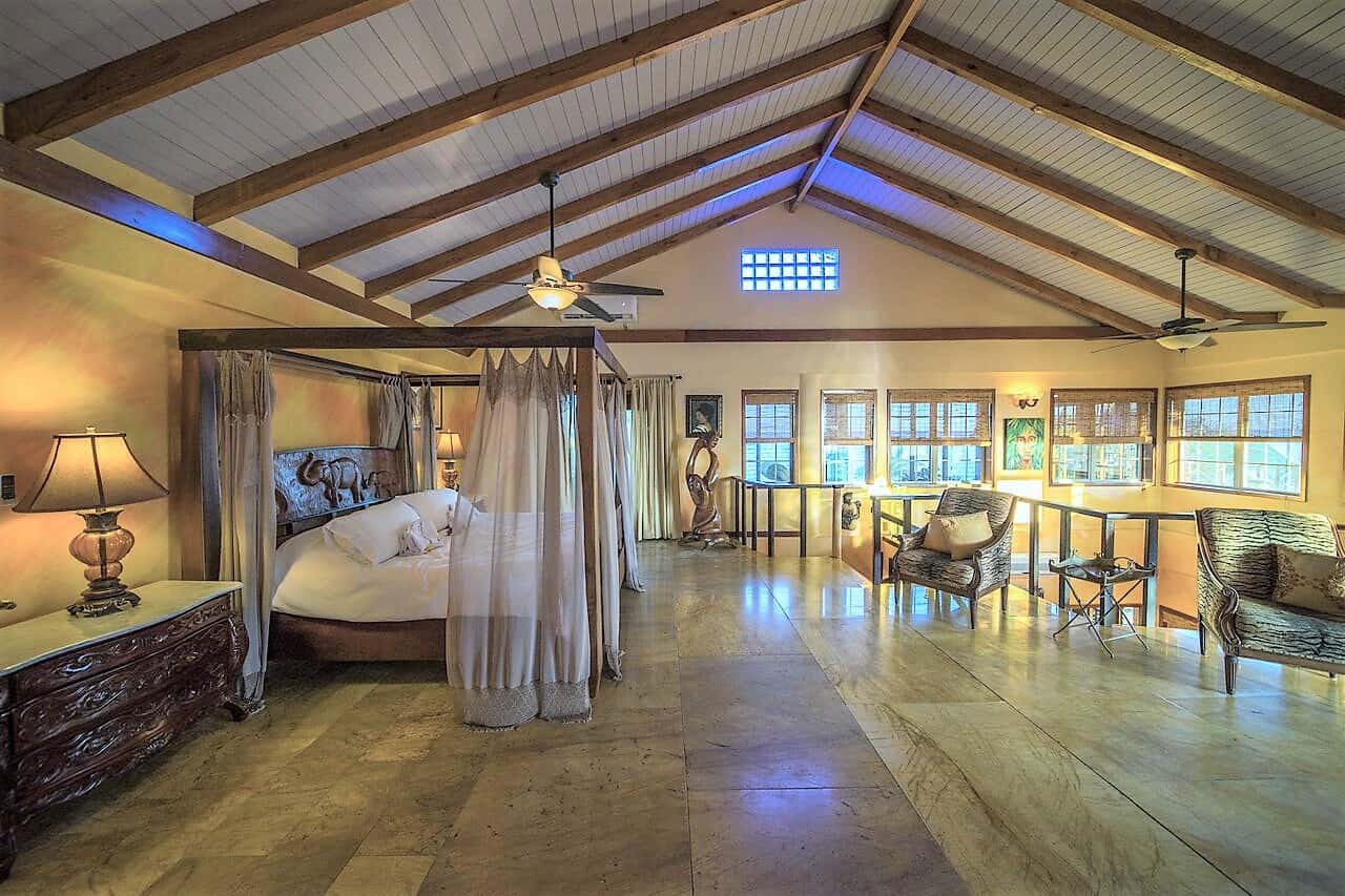 Luxury Seafront Premier Villa huge master bedroom with four poster bed