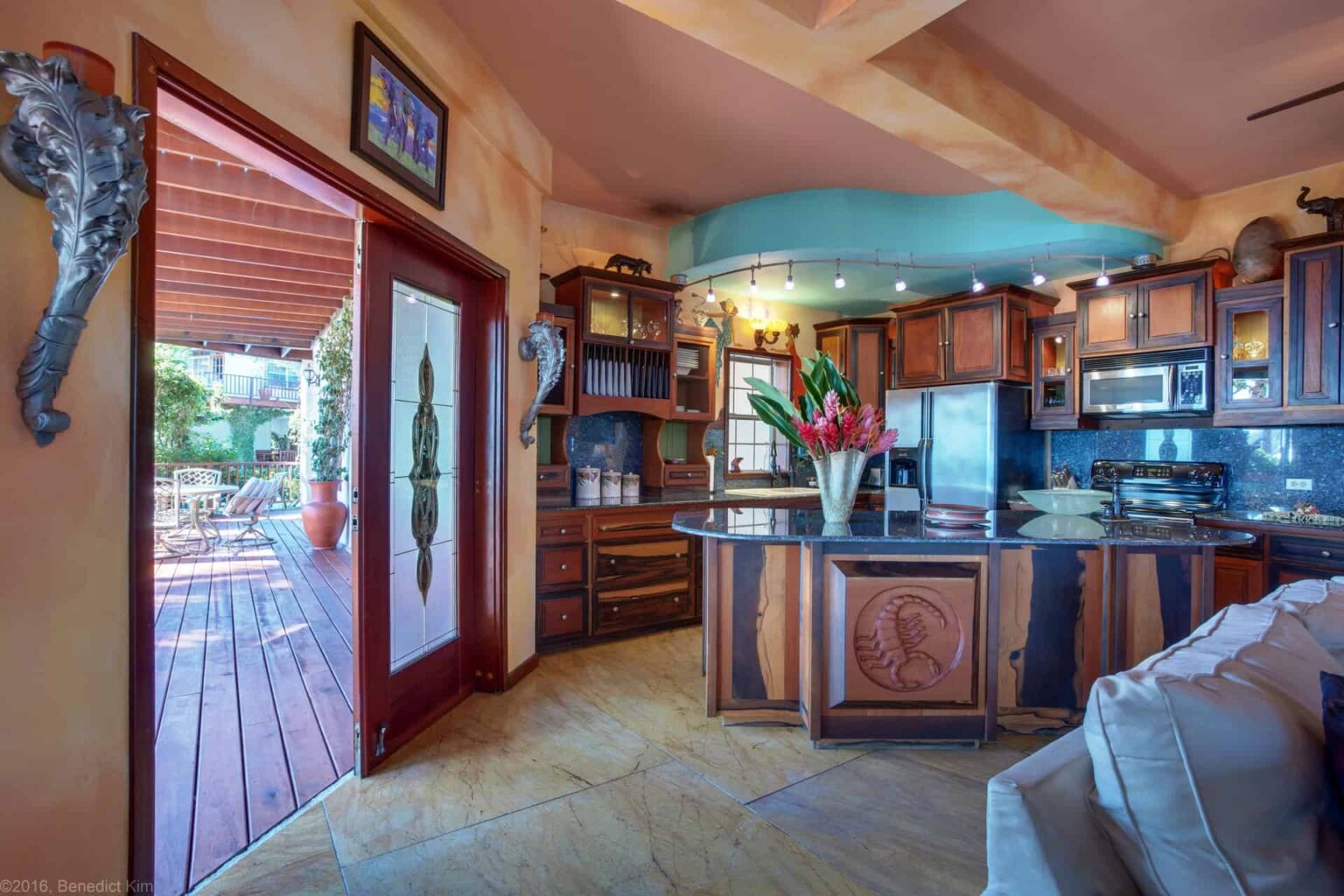Luxury Seafront Premier Villa kitchen with outdoor veranda access