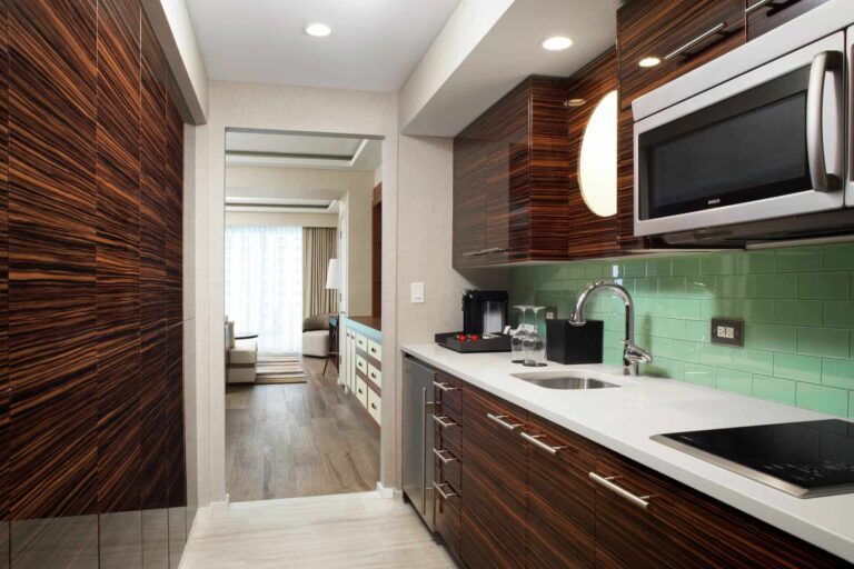 Conrad Fort Lauderdale suite kitchen with 2-burner cooktop.