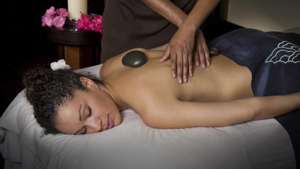 Woman receiving a massage at Mandara Spa.