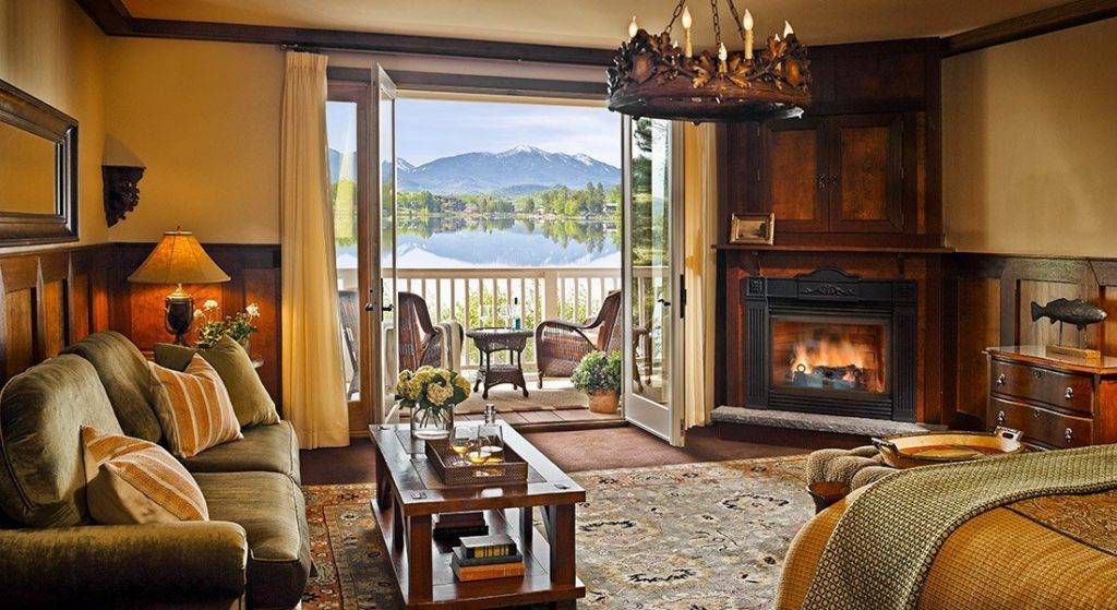 Suite with lake view and fireplace.