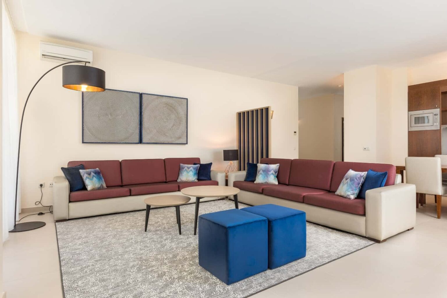 3 Bedroom Suite living area with plush sofas and coffee table