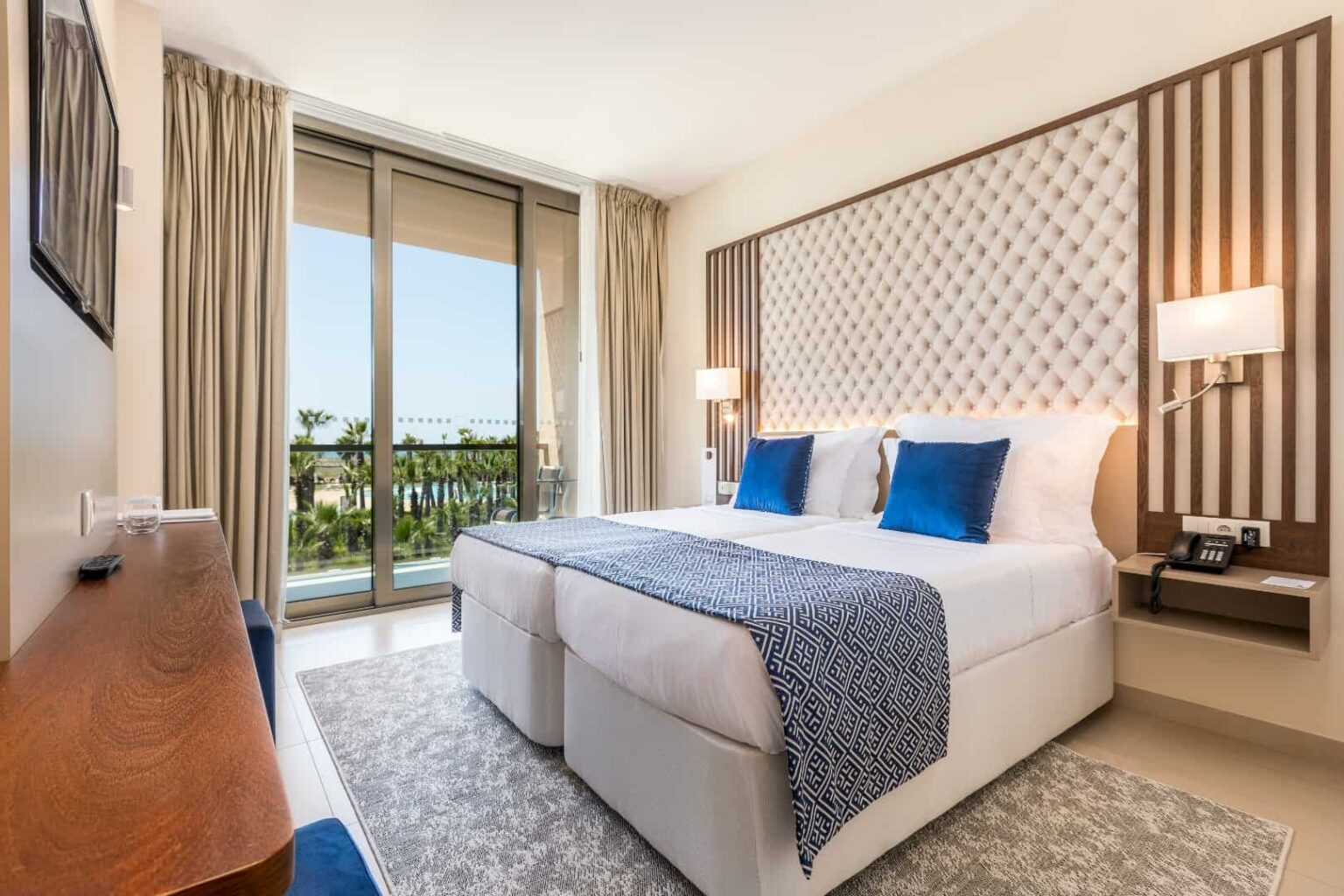 Double Room with sea view overlooking the resort pool area