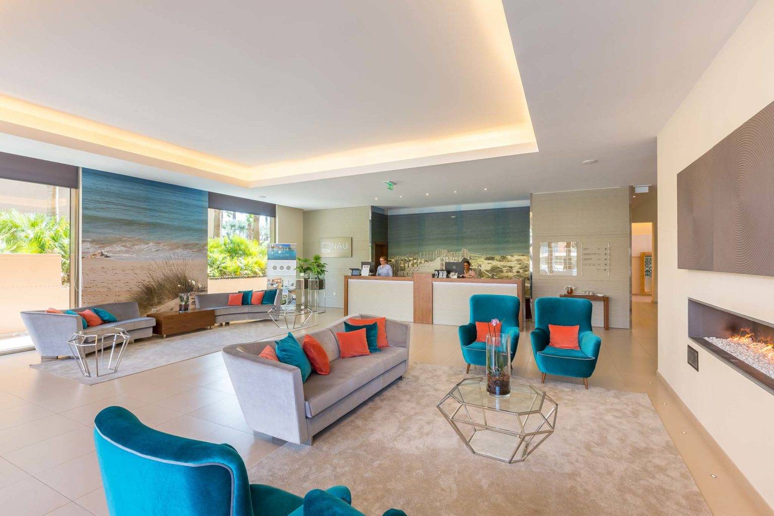 Salgados Dunas Suites reception area with comfortable seating.