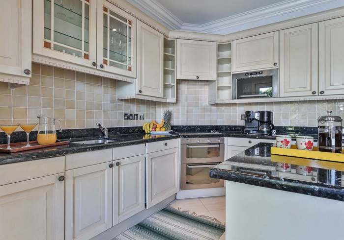 Large full kitchen with island sink: Cap Cove 3 Bedroom Townhouse