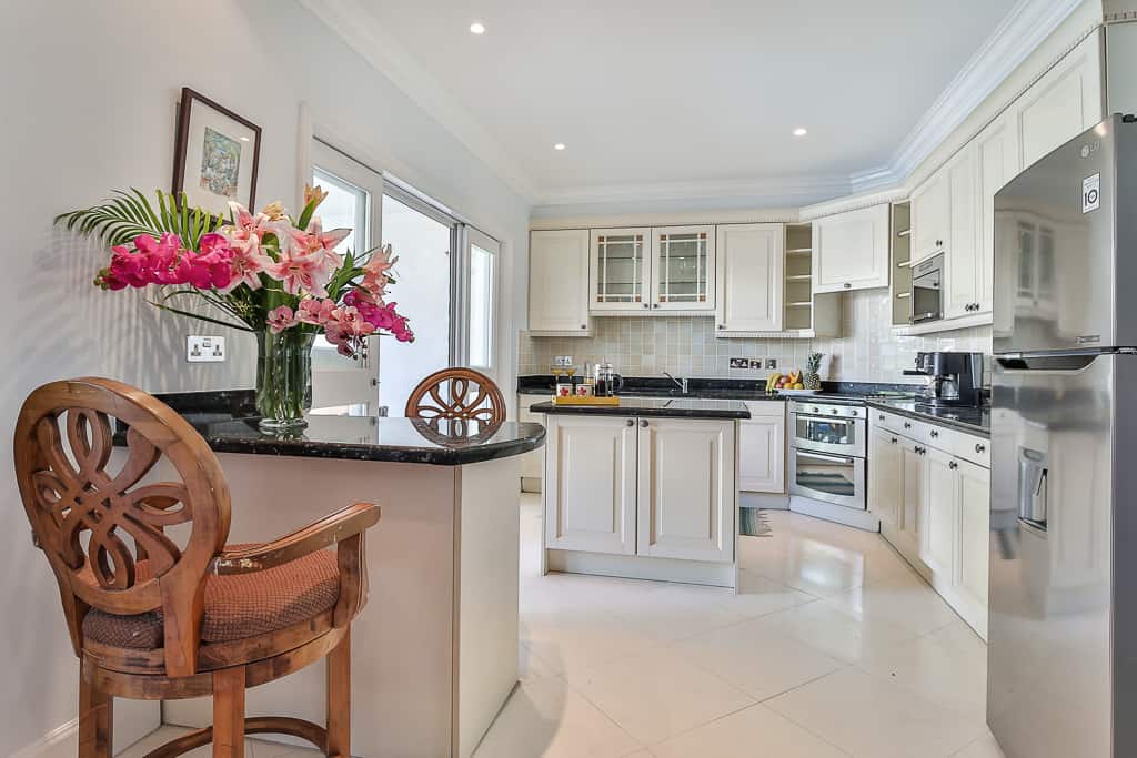 Spacious kitchen with island sink: Cap Cove 3 Bedroom Villa