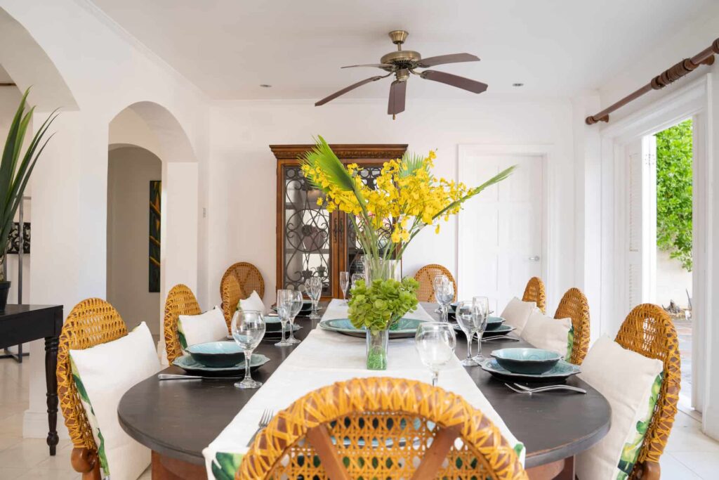 Large dining room set for a meal: Cap Cove 4 Bedroom Villa