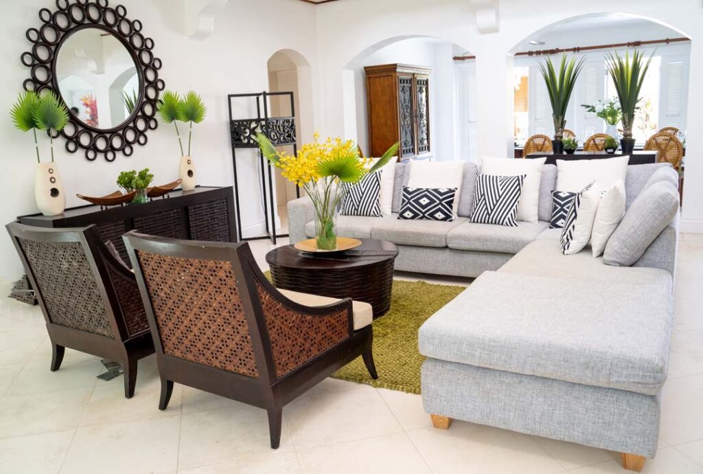 Spacious living room with large sectional sofa: Cap Cove 4 Bedroom Villa