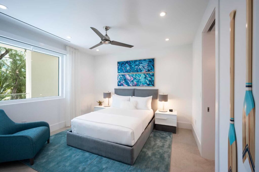 Queen suite bedroom: 3 Bedroom Residence at Rum Point Club