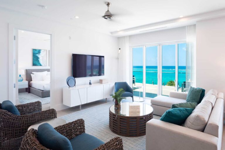 Living room with ocean view: 4 Bedroom Residence at Rum Point Club