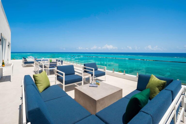 Expansive balcony with panoramic ocean views: 4 Bedroom Penthouse at Rum Point Club