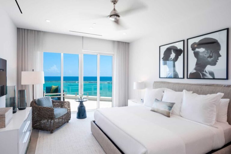 King bedroom with ocean view: 4 Bedroom Penthouse at Rum Point Club