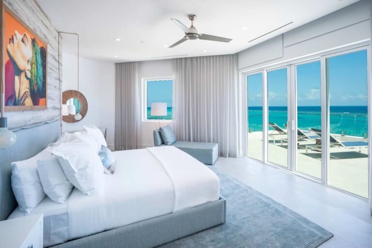 Master bedroom with ocean view: 4 Bedroom Penthouse at Rum Point Club