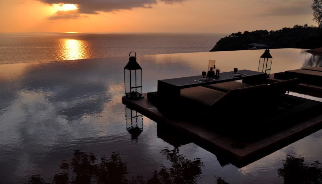 Sunset view from an infinity pool at the Paresa Resort