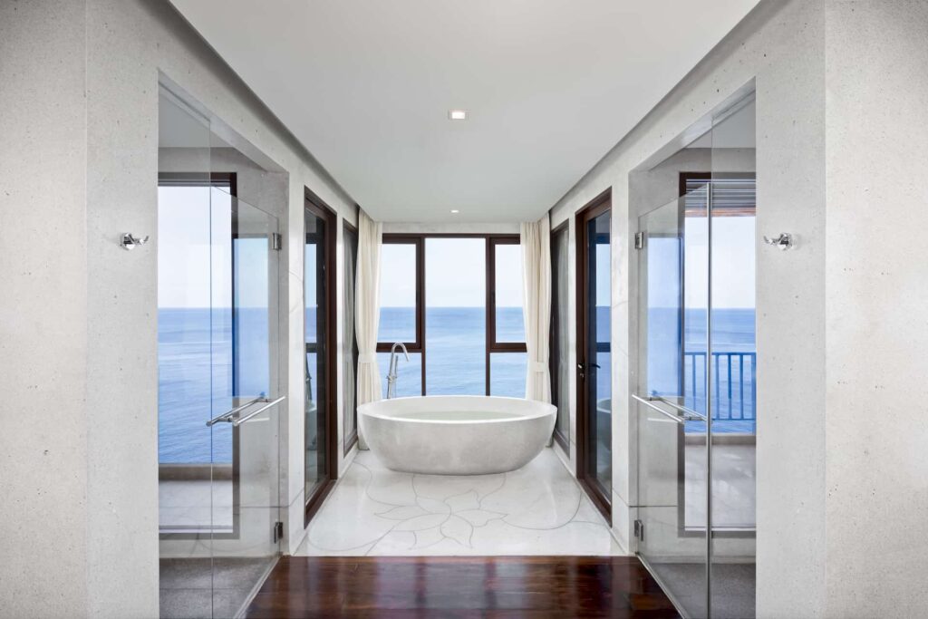 Cliff Pool Villa bathroom with freestanding tub and ocean view