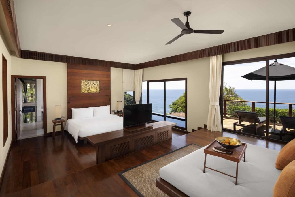 Spa Pool Suite bedroom with TV and ocean view
