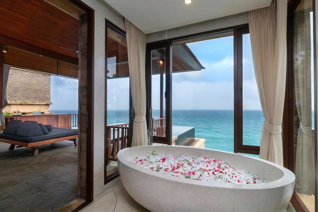 Bathtub filled with bubbles at the Paresa Resort