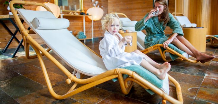 Mother and child hydrating in the Finisterra Spa relaxation room