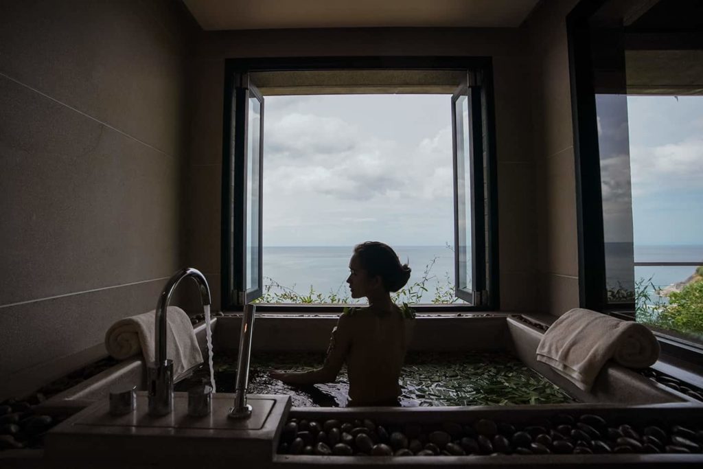 Woman bathing at the Paresa Resort Spa