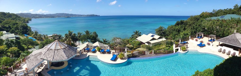 Calabash Cove resort pool overlooking the Caribbean Sea.