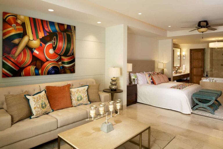 Grand Studio guest room living area with sofa and coffee table