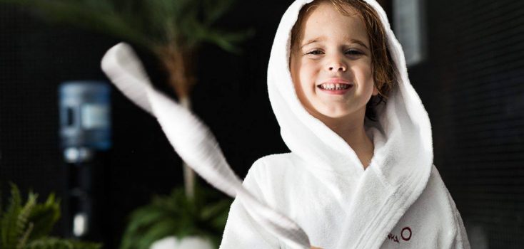 Child wearing Finisterra Spa bathrobe