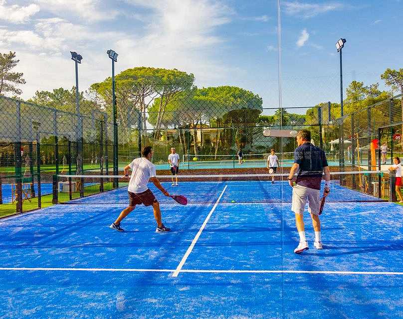 Group of people playing padel on a court