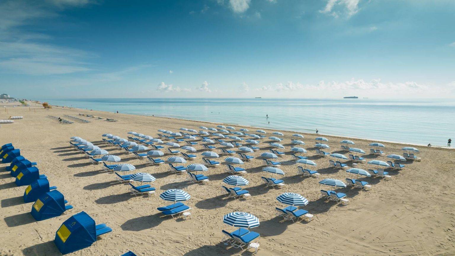 Miami Beach lined with umbrellas and lounge chairs