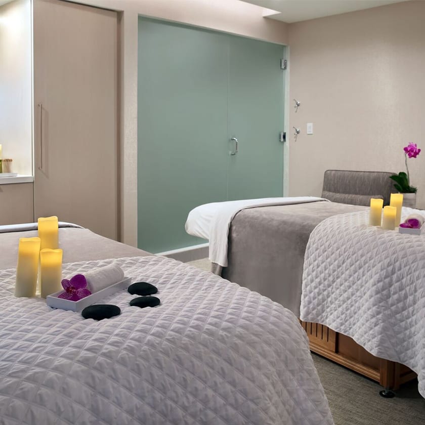 Conrad Fort Lauderdale Beach spa beds with candles and hot stones