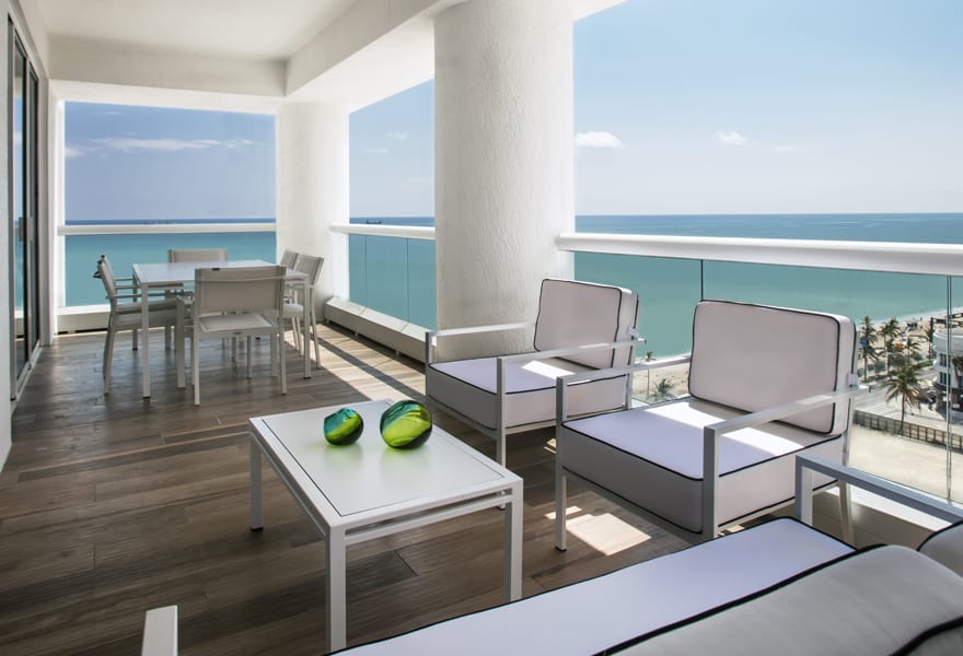 Furnished terrace overlooking the ocean at Conrad Fort Lauderdale Beach
