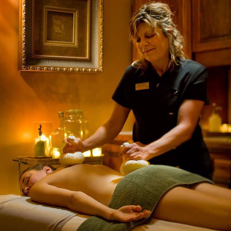 Woman receiving a massage at the Mirror Lake Inn Spa.