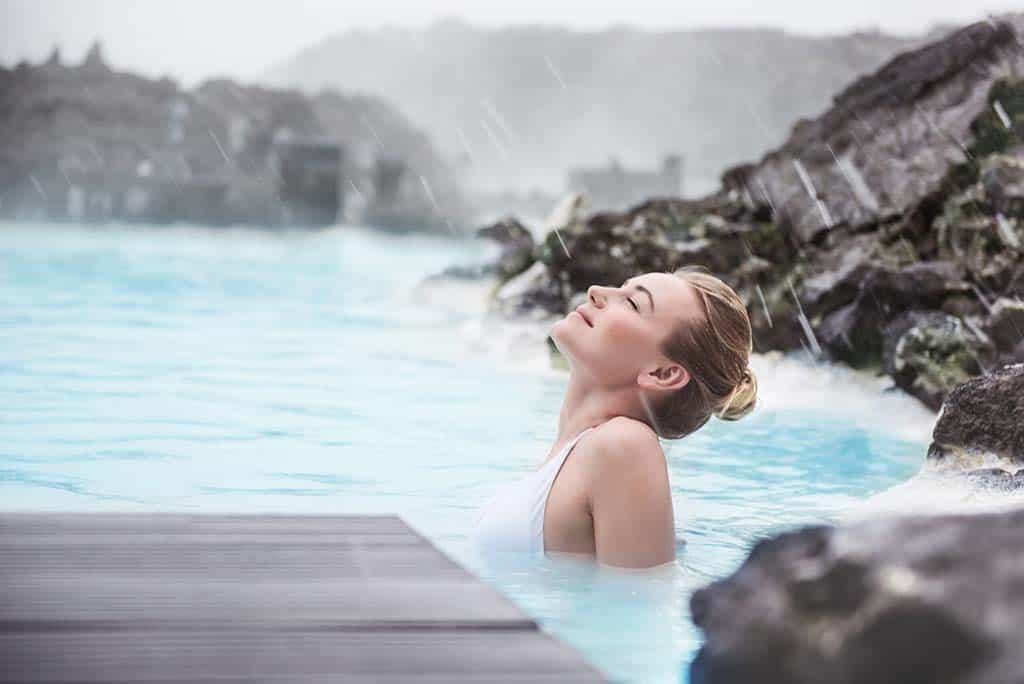 Woman relaxing in hot tub at the Agapi Beach Resort spa