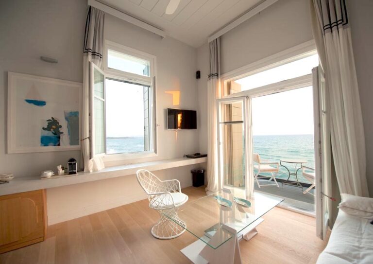 Dexamenes Beachfront Villa’s Suite sitting area with sea view terrace access