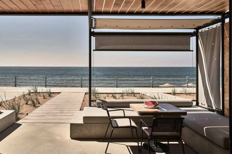 Beachfront Winetank Suite covered outdoor terrace overlooking the beach