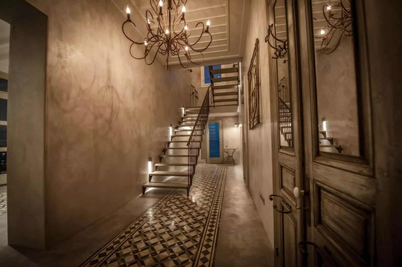 Dexamenes Beachfront Villa luxurious entry foyer with stairs to upper level.