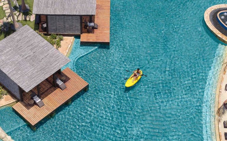 Couple kayaking in the lagoon pool | Grand Solmar at Rancho San Lucas Resort