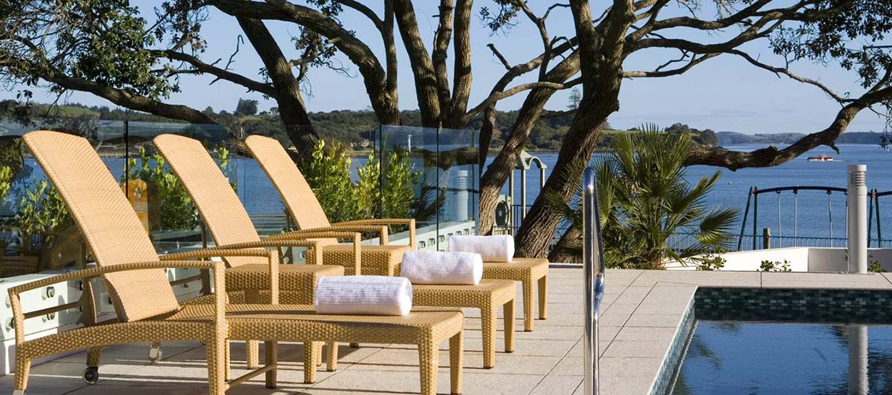 Wicker lounge chairs at Paihia Beach Resort