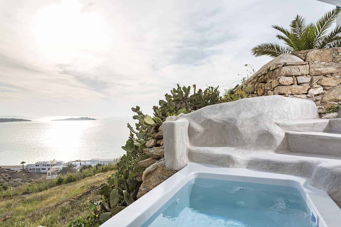 Boheme Mykonos luxury suite cliffside pool overlooking the Aegean Sea