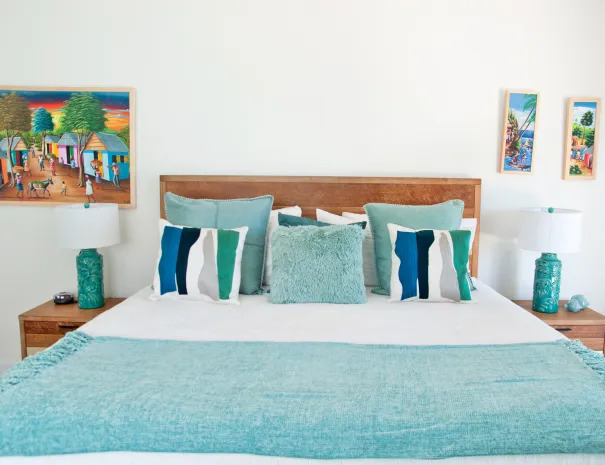 Blue Iguana guest room king bed with end tables